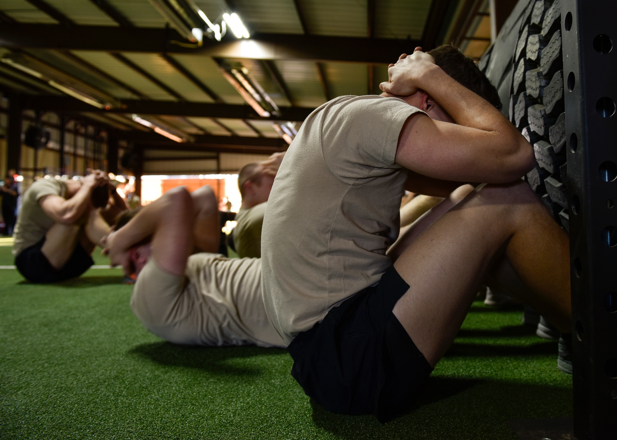 Participants in the Maltz Challenge perform sit-ups at Kirtland Air Force Base, N.M., March 15, 2019. This annual event began in 2006 and is held in memory of U.S. Air Force Master Sgt. Michael Maltz, a Pararescueman who was killed in action during a rescue mission in Afghanistan on March 23, 2003. (U.S. Air Force photo by Airman 1st Class Austin J. Prisbrey)