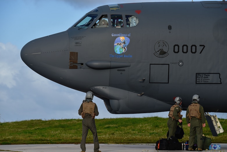 Aircrew assigned to the 23rd Expeditionary Bomb Squadron prepare to board a B-52 Stratofortress at Andersen Air Force Base, Guam, March 18, 2019.