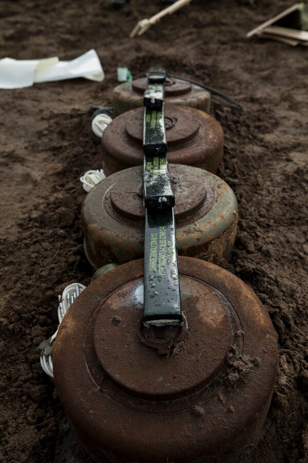 Landmines staged with C-4 for demolition during Cobra Gold 19 in the Kingdom of Thailand Feb. 18, 2019.  U.S. Marines assist the Royal Thai Armed Forces in teaching explosive ordnance disposal courses and disposing landmines. (U.S. Marine Corps photo by Cpl. Jamin M. Powell)