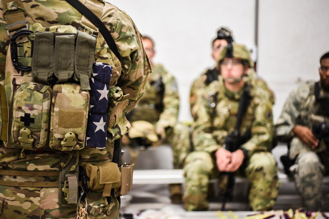 Airmen from across Air Force Global Strike Command attend a response force tactical course and receive a demonstration on M84 flashbangs Mar. 27, 2019, at the 90th Ground Combat Training Squadron, Camp Guernsey, Wyo. The response force tactical course is a five-day intensive program to teach Airmen how to infiltrate a building safe, sure and lethal when directed during active shooter scenarios. (U.S. Air Force photo by Senior Airman Abbigayle Williams)