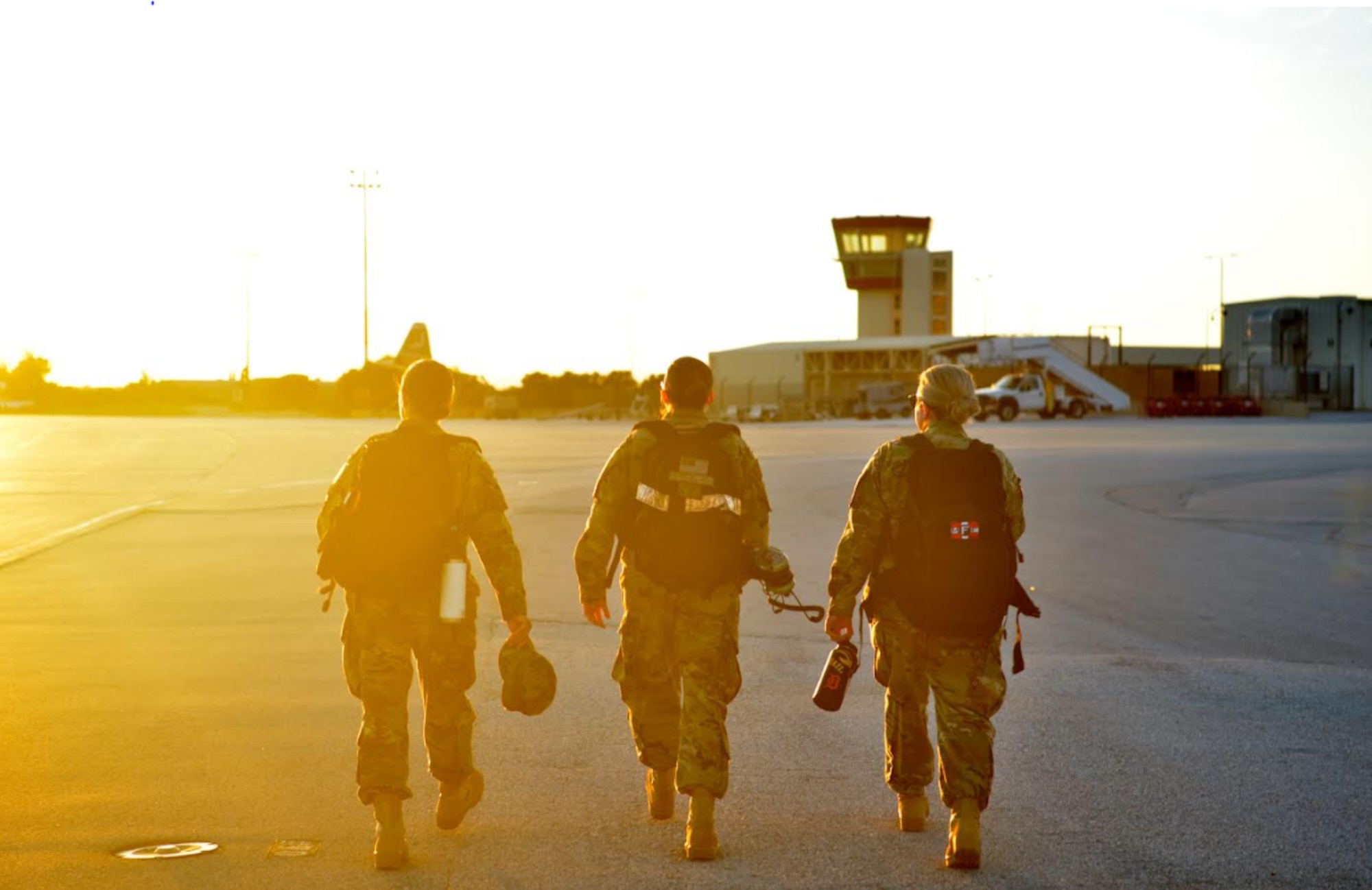 U.S. Air Force Tech. Sgt. Lindsay Hallford, 86th Maintenance Squadron aerospace propulsion C-130J engine mechanic, right, walks alongside U.S. Air Force Senior Airman Nicole Merriss, 86th Maintenance Squadron aerospace propulsion craftsman, left, and U.S. Air Force Airman First Class Ariel Houser, 86th Maintenance Squadron aerospace propulsion apprentice, middle, on the flight line at Crete Naval Base, Greece, March 8, 2019. The team completed a propeller swap on a C-130J Super Hercules Aircraft.