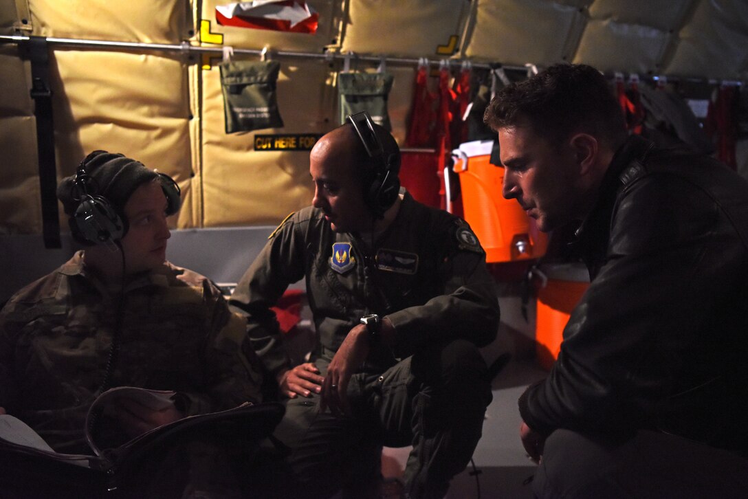 U.S. Airmen discuss maintenance options prior to take-off for refueling training with Romanian air force F-16s in Bucharest, Romania, March 12, 2019. The crew was involved in training over the skies of Romania, which enhanced regional capabilities to secure air sovereignty and promote peace and security through cooperation, collaboration, interoperability with NATO allies in the region. (U.S. Air Force photo by Airman 1st Class Brandon Esau)