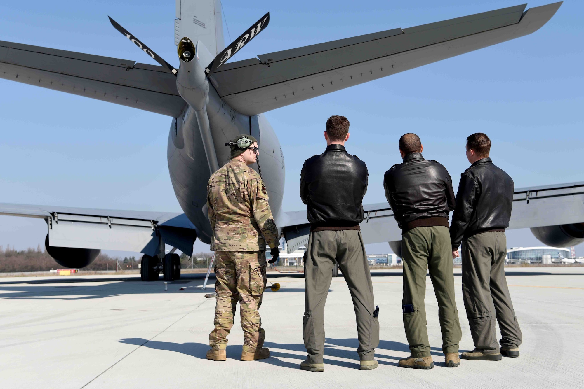 U.S. Airmen conduct a walk-around prior to take-off for refueling training with Romanian air force F-16s in Bucharest, Romania, March 13, 2019. The crew was involved in training over the skies of Romania, which enhanced regional capabilities to secure air sovereignty and promote peace and security through cooperation, collaboration, interoperability with NATO allies in the region. (U.S. Air Force photo by Airman 1st Class Brandon Esau)