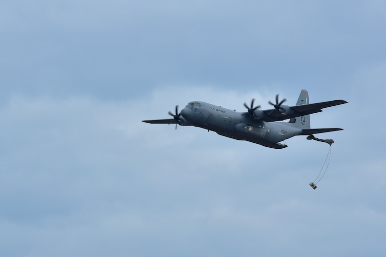 A C-130J does an airdrop.