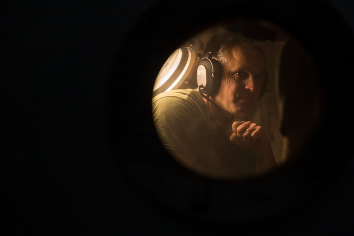 Senior Chief Mark Sawyer, a master diver with 3rd Reconnaissance Battalion, III Marine Expeditionary Force, monitors Marines from inside a Standard Navy Double Lock Hyperbaric Recompression Chamber at Camp Schwab, Okinawa, Japan, Jan. 9, 2019. Sawyer observed the Marines to ensure their safety while in a SNDLRCS during a training scenario to simulate the pressure felt when diving up to 60 feet in order to enhance combat readiness.