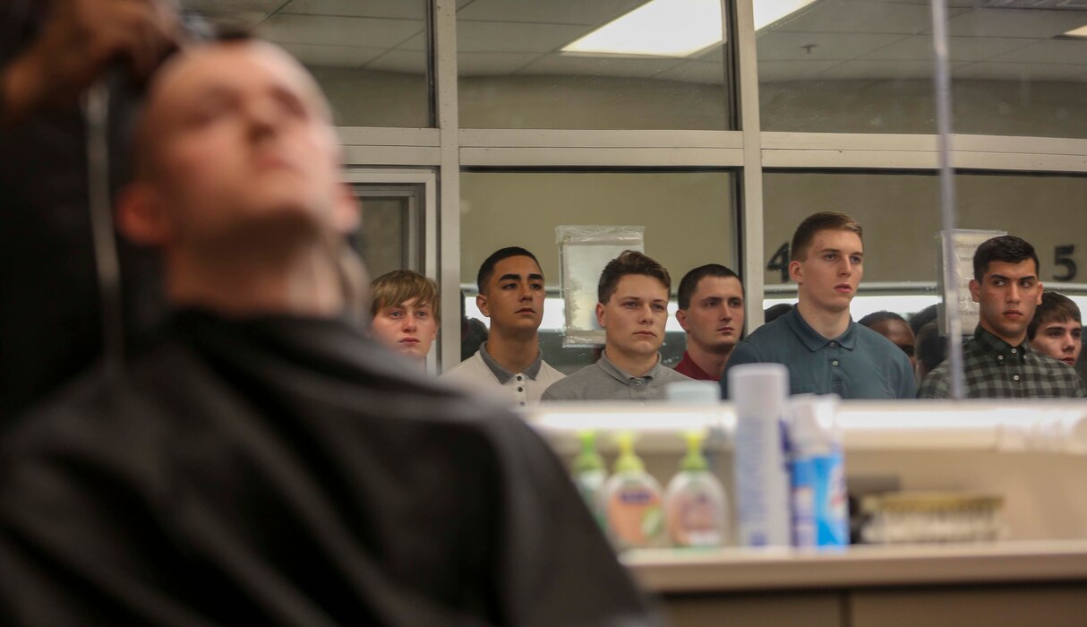 New recruits with Lima Company, Third Recruit Training Battalion, receive their first haircuts during receiving Feb. 20, 2019 on Parris Island, S.C.  A small step in the transformation of becoming United States Marines, weekly haircuts are meant to strip recruits of their individuality and for hygienic purposes. During their first night on the island, recruits are issued gear and uniforms, receive haircuts, and process in their medical and dental records.
(U.S. Marine Corps photo by Sgt. Dana Beesley)