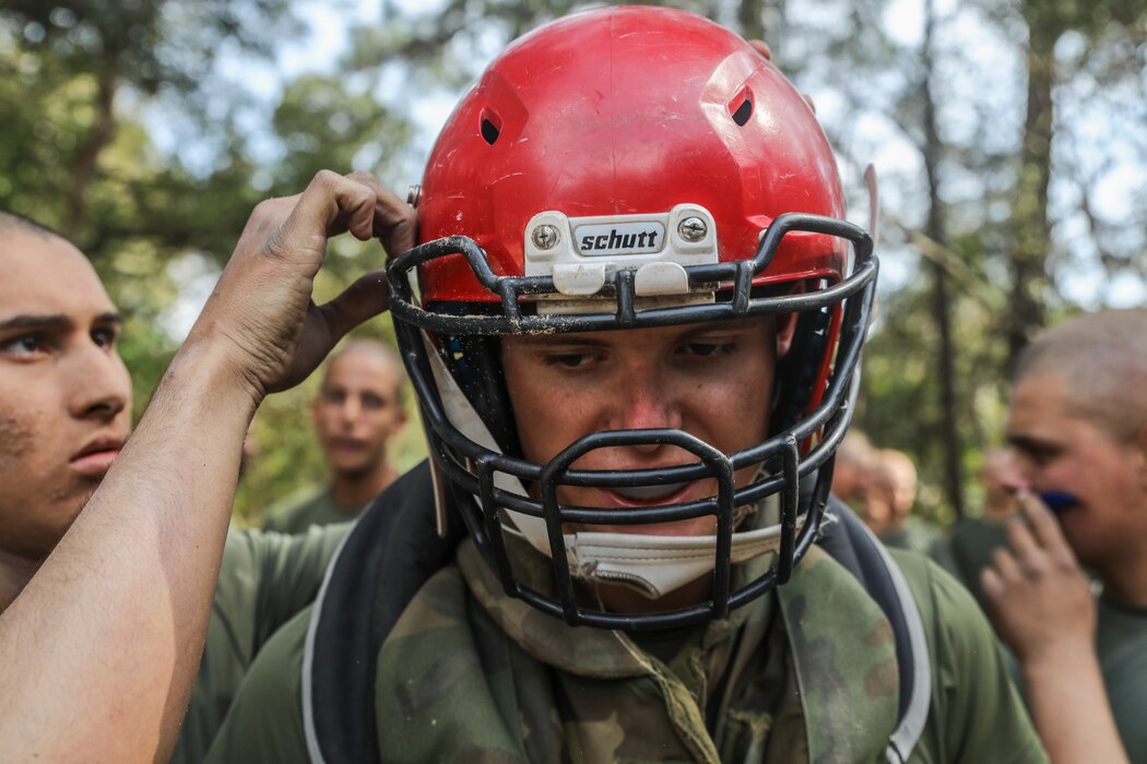 Recruit Joseph Dickman with India Company, 3rd Recruit Training Battalion, engages in body sparring and pugil sticks during the crucible at Marine Corps Recruit Depot Parris Island, S.C., Mar. 15, 2019. Body sparring and pugil sticks help recruits apply the fundamentals of Marine Corps martial arts. (U.S. Marine Corps Photo by Lance Cpl. Shane T. Manson)