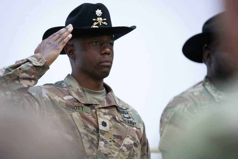 U.S. Army Lt. Col. Omar T. Minott, New Jersey National Guard’s 1st Squadron, 102nd Cavalry Regiment (1-102 CAV) commander, salutes for the playing of the National Anthem during his unit’s transfer of authority ceremony at the Joint Training Center in Jordan March 14, 2019. The 1-102 CAV took over for the California National Guard’s 1st Squadron, 18th Cavalry Regiment’s who had spent the last nine-months work with Jordan Operational Engagement Program.