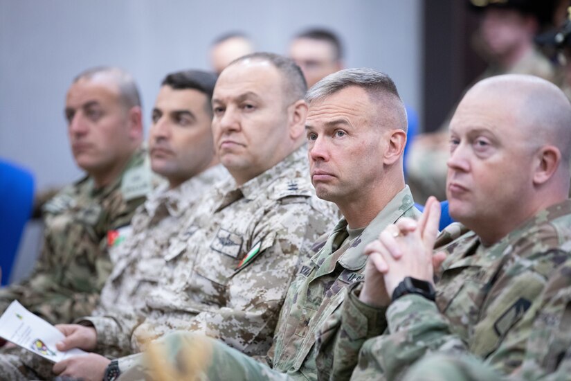 U.S. Army Brig. Gen. Michael D. Wickman (second from right), deputy commanding general – maneuver, 34th Infantry Division Forward sits with other distinguished guests from the U.S. Army and Jordan Armed Forces, during a transfer of authority ceremony at the Joint Training Center, March 14, 2019. During the ceremony, the New Jersey National Guard’s 1st Squadron, 102nd Cavalry Regiment assumed mission authority from the California National Guard’s 1st Squadron, 18th Cavalry Regiment.