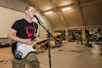 Army Sgt. Christian Bueng, a musician with the Red Devil Rock Band, 34th Red Bull Infantry Division Band, Minnesota National Guard, performs cover songs on March 16, 2019, at Camp Arifjan, Kuwait. U.S. Army Central hosts these types of events to demonstrate its enduring commitment to Soldiers’ health, welfare and morale.