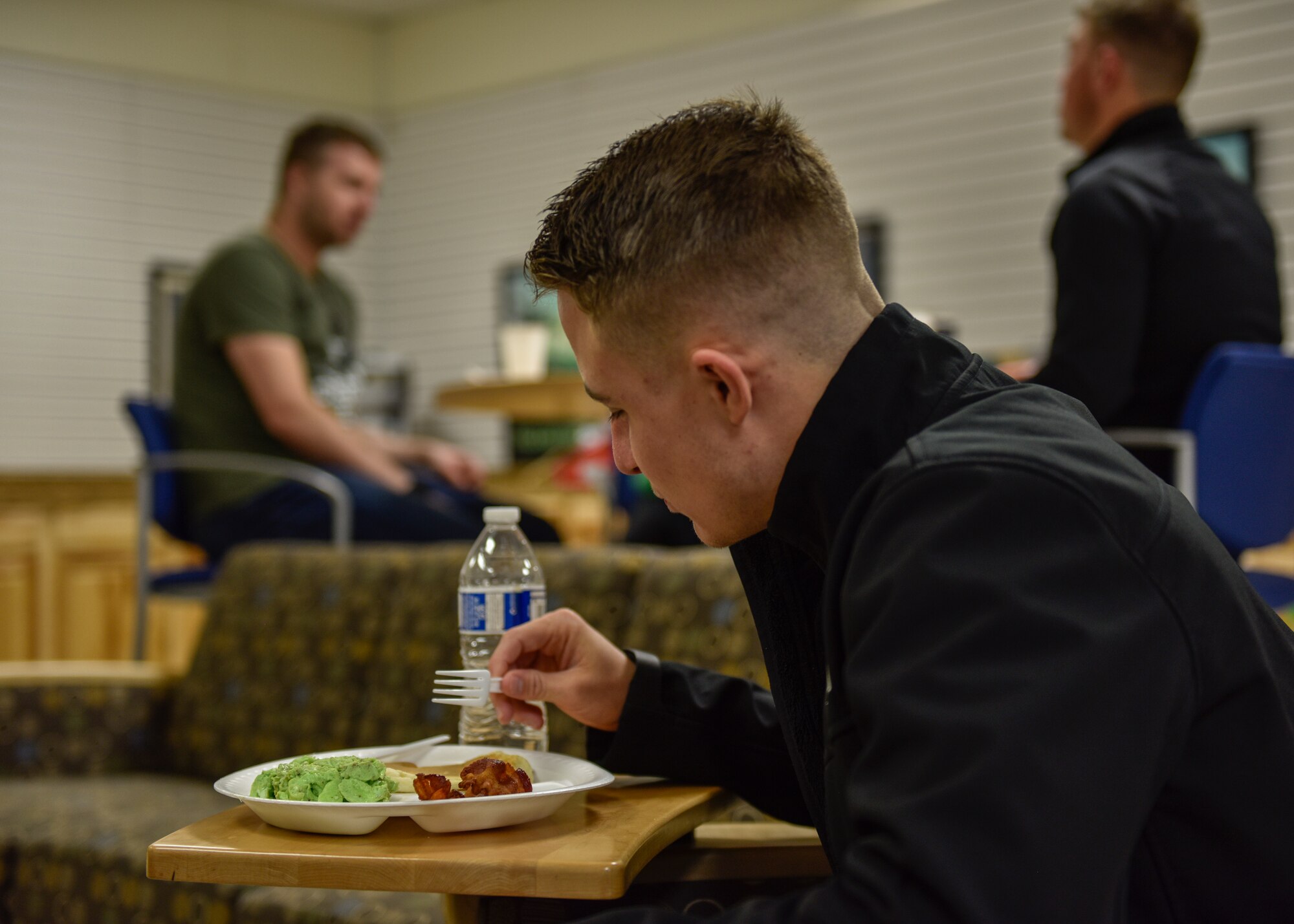 U.S. Air Force Airman 1st Class Cody Mullen, 58th Special Operations Wing Client Systems technician, takes part in the first “4 Airmen for Airmen” event at Kirtland Air Force Base, N.M., March 17, 2019. Breakfast was provided by “4 Airmen for Airmen,” a grass-roots effort by Airmen who are committed to making a positive difference by building community, connections and support they hope to hold more events like the breakfast in the future. (U.S. Air Force photo by Airman 1st Class Ausitn J. Prisbrey)