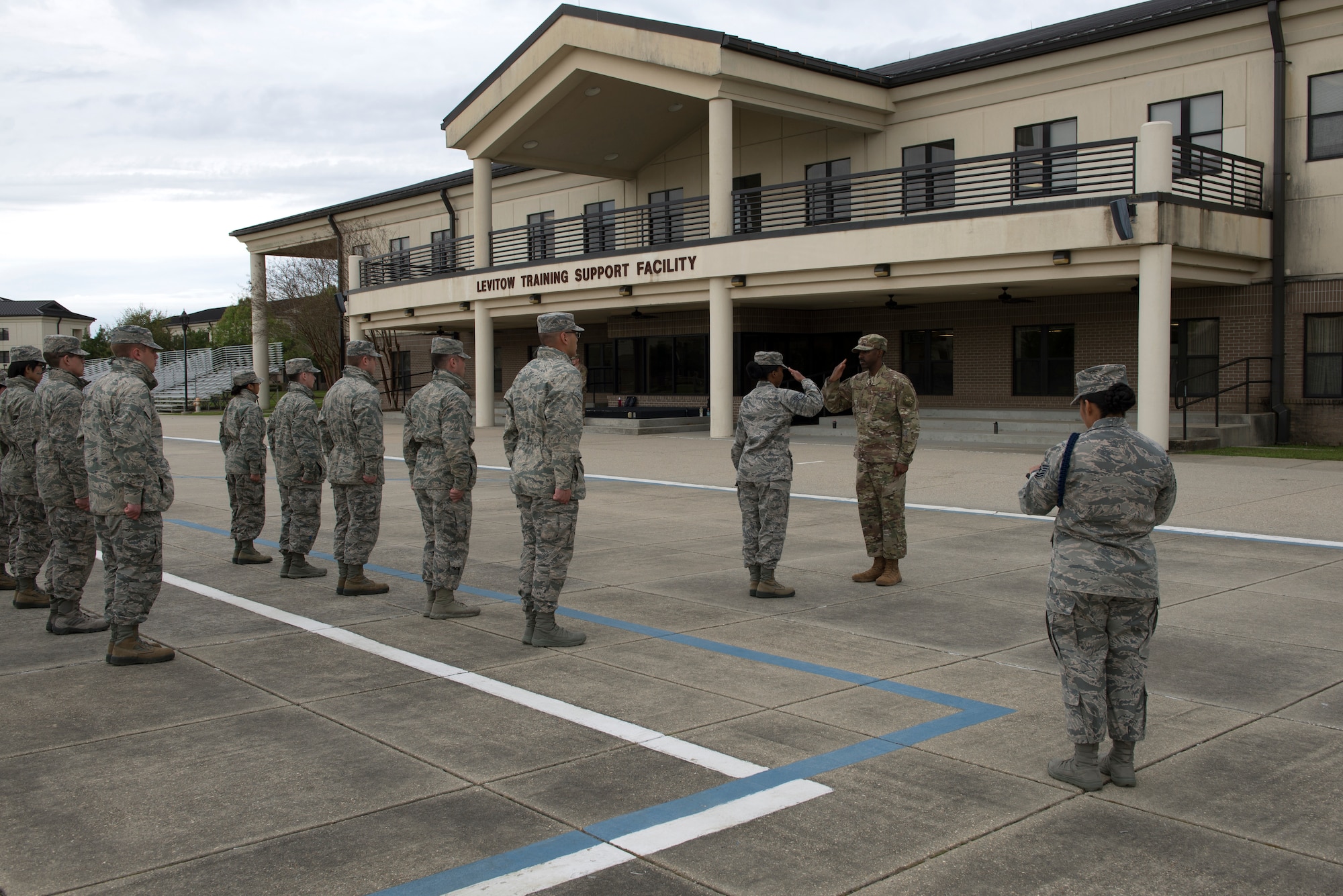 U.S. Air Force Tech. Sgt. Victoria Monzon, 81st Training Support Squadron military training leader instructor, evaluates an open-ranks inspection at the Levitow Training Support Facility drill pad at Keesler Air Force Base, Mississippi, March 15, 2019. The evaluation allowed Monzon to assist her students in performing a higher quality open-ranks inspection and strengthen the students’ skill-sets as future MTLs. (U.S. Air Force photo by Airman 1st Class Kimberly Mueller)