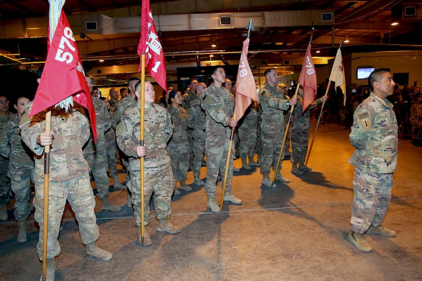Members of the 578th Brigade Engineer Battalion, California Army National Guard, stand in formation during a transfer of authority ceremony Mar. 16, 2019 at Camp As Sayliyah in Qatar. The unit just completed a 9-month rotation in support of Area Support Group Qatar.