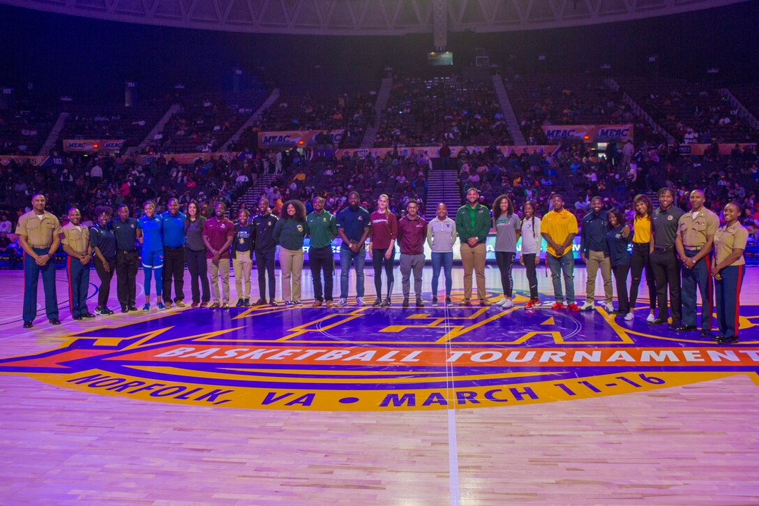 Marines and student athletes get recognized during the Battles Won Symposium On-Court Presentation in Norfolk, Virginia, March 16. Through a partnership with the Mid-Eastern Athletic Conference, the Marine Corps recognizes and celebrates student-athletes who display strong leadership qualities through their commitment to hard work both in and out of the classroom. (U.S. Marine Corps photo by Lance Cpl. Mitchell Collyer)