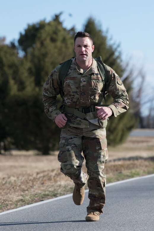 Staff Sgt. Christopher Atkinson, 436th Maintenance Squadron, competes in the 20th Annual Chosin Ruck March on March 16, 2019, at the Air Mobility Command Museum on Dover Air Force Base, Del. The course started and ended at the AMC Museum adjacent to Dover AFB. (U.S. Air Force Photo by Mauricio Campino)