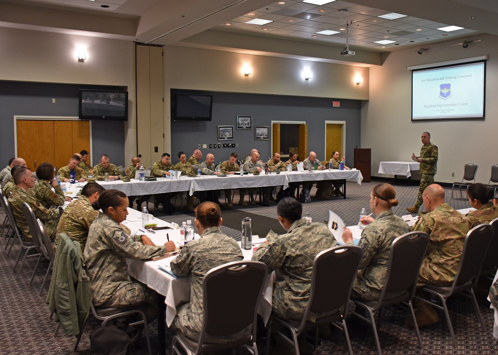 U.S. Air Force Chief Master Sgt. Jason Funkhauser, 315th Training Squadron chief enlisted manager, speaks with attendees of the Superintendent Course at the Event Center on Goodfellow Air Force Base, Texas, March 18, 2019. Funkhauser spoke with the group about his experiences and the importance of teamwork for a superintendent. (U.S. Air Force photo by Airman 1st Class Zachary Chapman/Released)