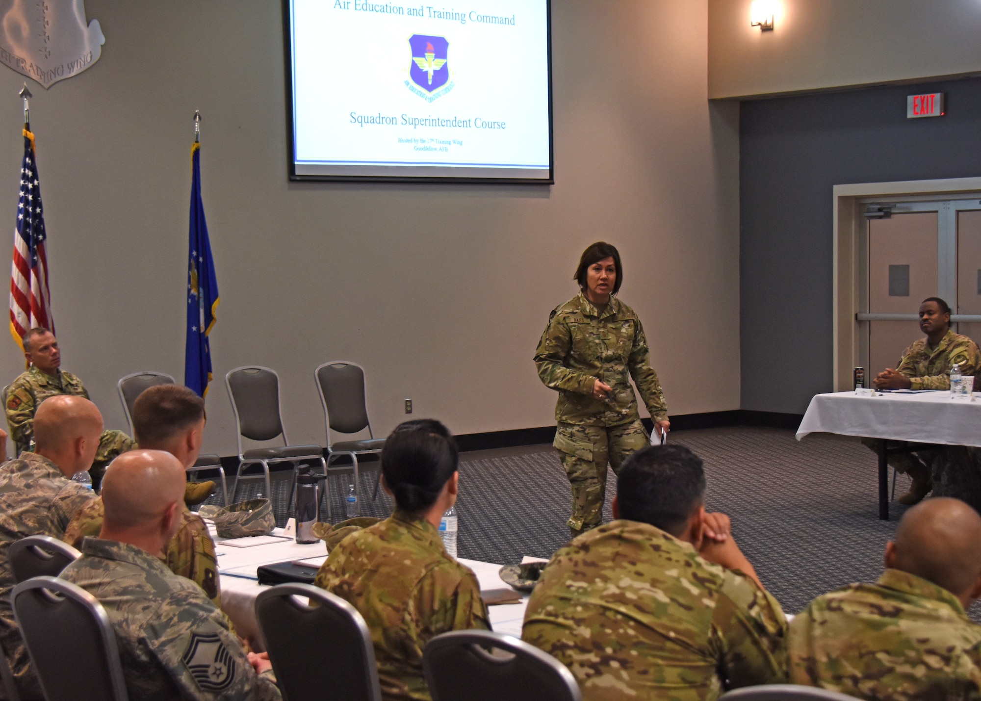 U.S. Air Force Chief Master Sgt. Joanne Bass, 2nd Air Force command chief, addresses the group of approximately 50 current or soon to be superintendents during the Superintendent Course at the Event Center on Goodfellow Air Force Base, Texas, March 18, 2019. The joint experience and different viewpoints provided by those in attendance provided guidance on how to better serve their troops and their squadron. (U.S. Air Force photo by Airman 1st Class Zachary Chapman/Released)