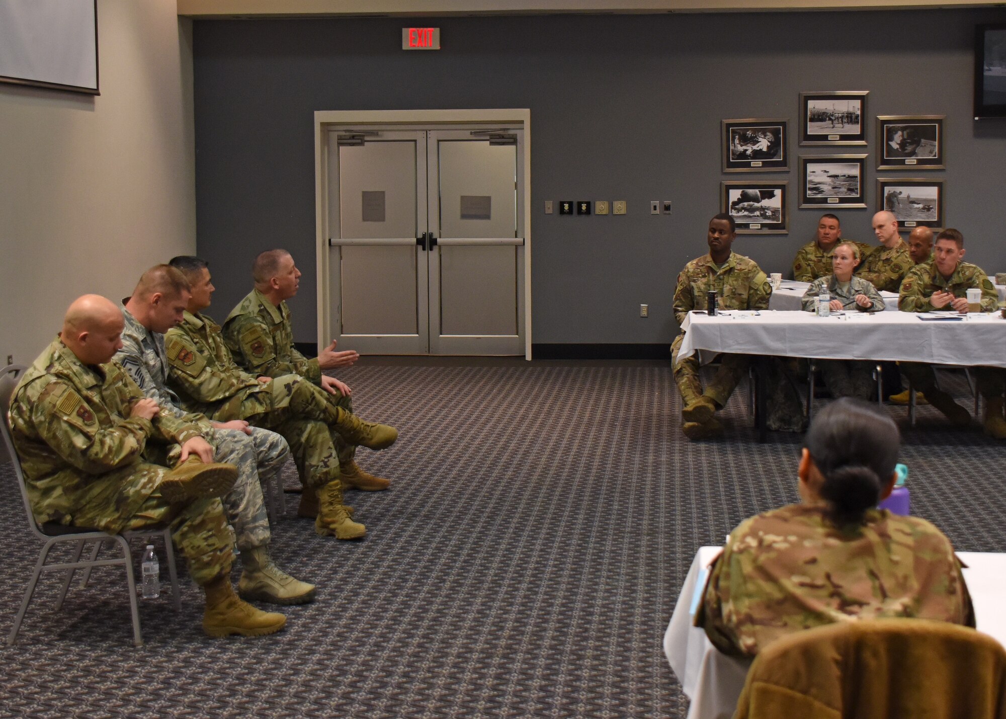 U.S. Air Force Chief Master Sgt. Jason Funkhauser, 315th Training Squadron chief enlisted manager, and his fellow 315th TRS triad talk with attendees of the Superintendent Course, at the Event Center on Goodfellow Air Force Base, Texas, March 18, 2019. A triad consists of the first sergeant, superintendent and commander who work with each other to make sure the squadron’s mission gets completed. (U.S. Air Force photo by Airman 1st Class Zachary Chapman/Released)