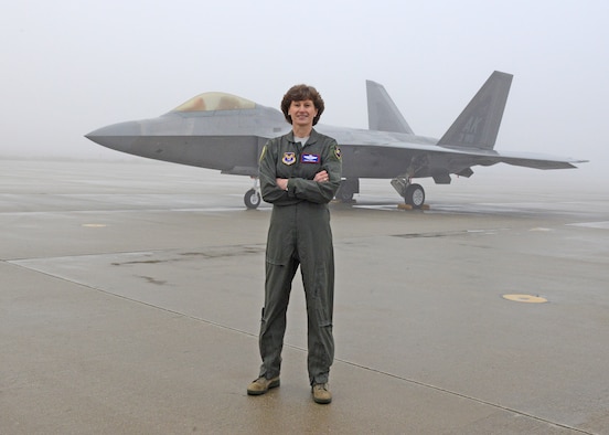 Maj. Gen. Dawn Dunlop, Special Access Program Central Office director, Office of the Undersecretary of Defense for Acquisition and Sustainment, poses for a photo in front of an F-22 Raptor at Edwards Air Force Base, California Feb. 20, 2019. Dunlop was accompanied by more than 80 fellow female aviators to take part in filming of an Air Force Recruiting Service television commercial. (U.S. Air Force photo by Kenji Thuloweit).