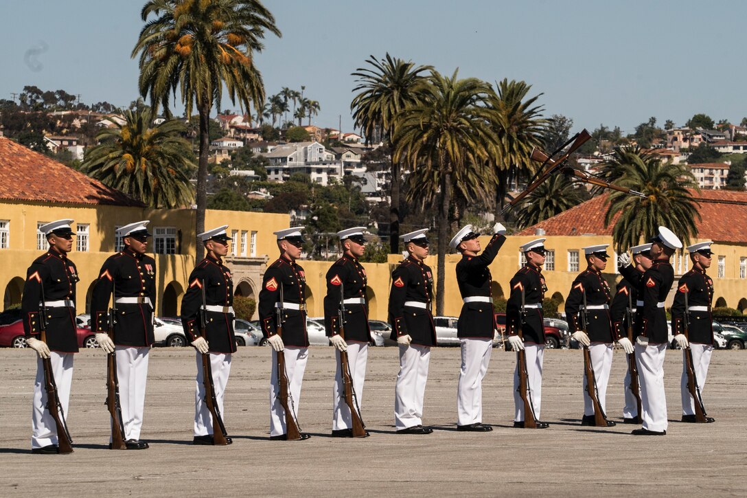 U.S. Marines assigned to the Silent Drill Platoon perform during the Battle Color Ceremony on Marine Corps Recruit Depot San Diego, March 16. The Battle Color Detachment consists of the Drum & Bugle Corps, the Silent Drill Platoon, and the Marine Corps Color Guard who travel and perform throughout the nation, celebrating Marine Corps history. (U.S. Marine Corps photo by Sgt. Christian Cachola)
