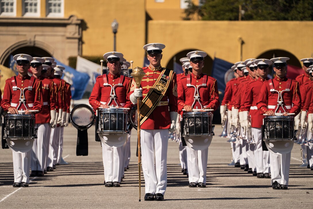 The U.S. Marine Corps Drum & Bugle Corps stand at attention during the Battle Color Ceremony on Marine Corps Recruit Depot San Diego, March 16. The Battle Color Detachment consists of the Drum & Bugle Corps, the Silent Drill Platoon, and the Marine Corps Color Guard who travel and perform throughout the nation, celebrating Marine Corps history. (U.S. Marine Corps photo by Sgt. Christian Cachola)