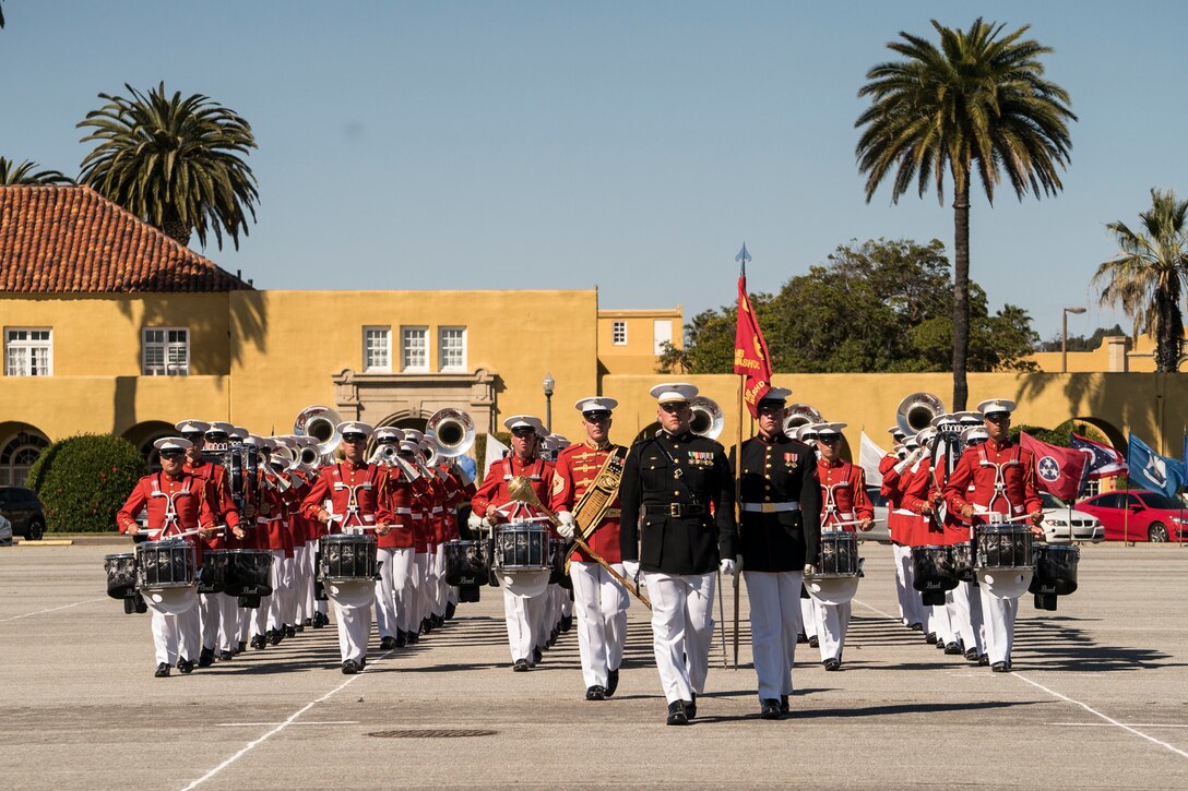 U.S. Marines assigned to the Battle Color Detachment conduct a Pass in Review during the Battle Color Ceremony at Marine Corps Recruit Depot San Diego, March 16. The Battle Color Detachment consists of the Drum & Bugle Corps, the Silent Drill Platoon, and the Marine Corps Color Guard who travel and perform throughout the nation, celebrating Marine Corps history. (U.S. Marine Corps photo by Sgt. Christian Cachola)