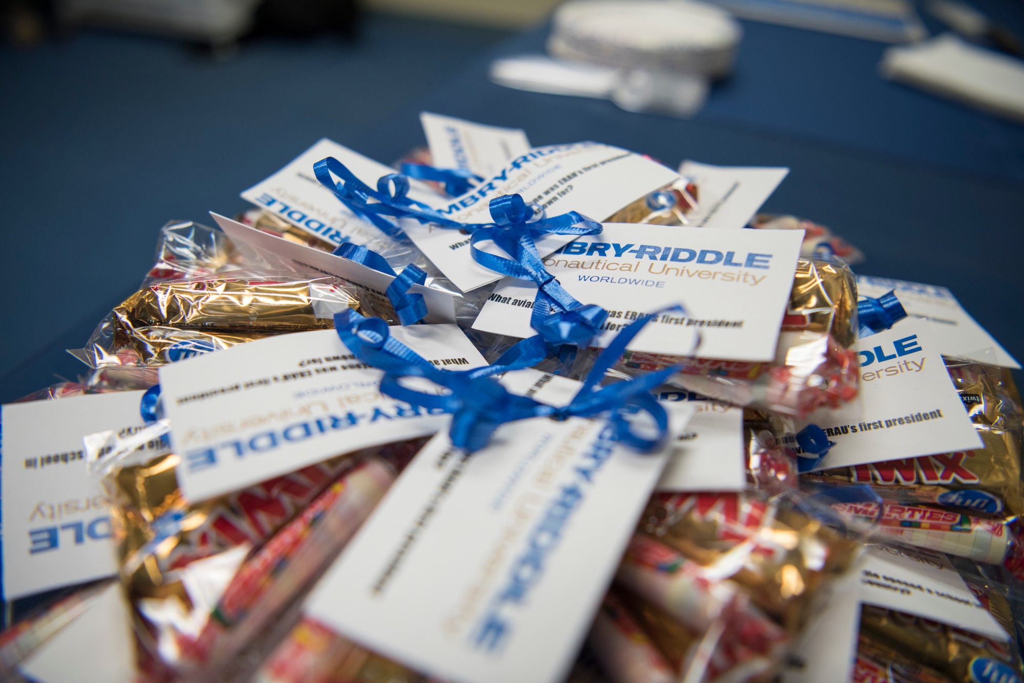 Embry-Riddle Aeronautical University business cards sit on a table at the ERAU grand re-opening at Misawa Air Base, Japan, March 13, 2019. Upon completion of the nine-week course, students receive a certificate in aviation maintenance technology aiding in a better understanding of avionic regulations and procedures Wild Weasel maintainers can apply during daily operations. (U.S. Air Force photo by Airman 1st Class Collette Brooks)