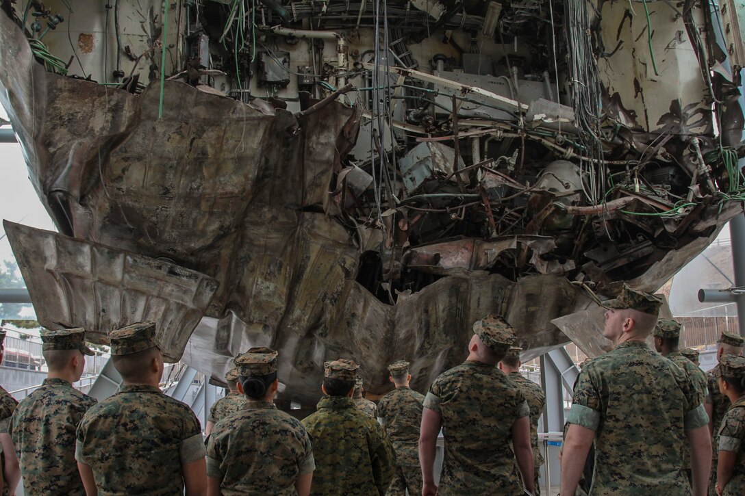CHEONAN, Republic of Korea – Marines with U.S. Marine Corps Forces Korea receive a professional military education class on the 2nd Republic of Korea Naval Fleet and their history of battle with the Democratic Peoples’ Republic of Korea here, March 20. The Marines learned about the major Naval conflicts that occurred after the signing of the armistice agreement in 1953 following the Korean war, as well as getting to see the wreckage of a ROK naval vessel that was sunk during one of those conflicts; resulting in the deaths of 46 ROK sailors. (Official U.S. Marine Corps photos by Sgt. Nathaniel Hanscom/Released)