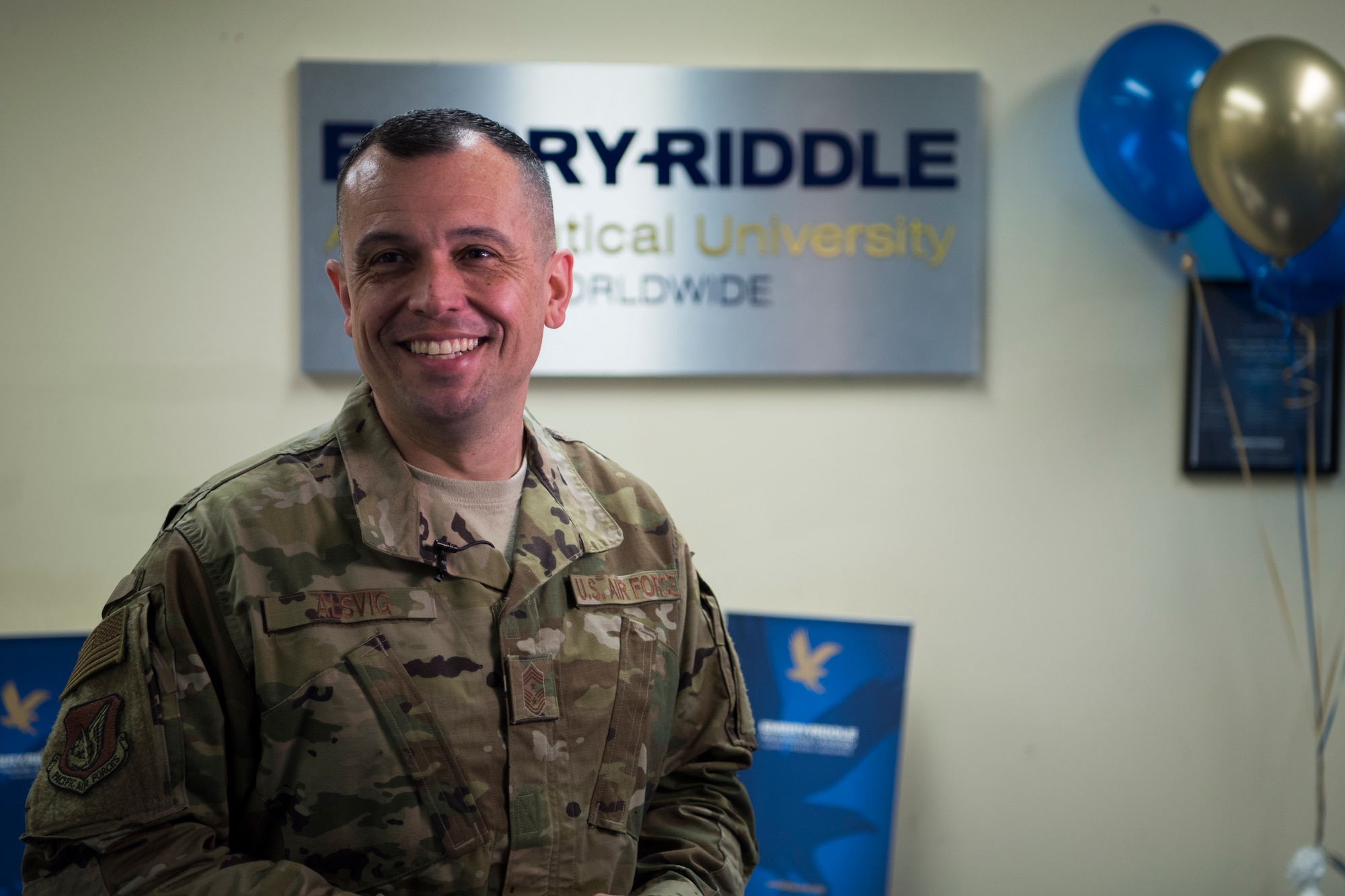 U.S. Air Force Chief Master Sgt. John C. Alsvig, the 35th Fighter Wing command chief, pauses for a photo during the grand re-opening of Embry-Riddle Aeronautical University at Misawa Air Base, Japan, March 13, 2019. Alsvig encourages Team Misawa members to take advantage of the on-base colleges to further their educational goals. (U.S. Air Force photo by Airman 1st Class Collette Brooks)