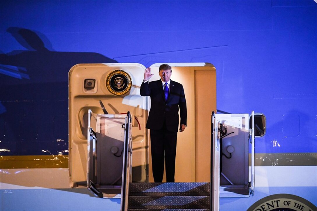 President Donald Trump disembarks from Air Force One at Noi Bai International Airport in Hanoi on Feb. 26. (Courtesy photo by Manan Vatsyayana / AFP - Getty Images)