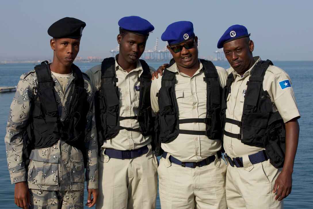 Service members from Djibouti and Somalia pose for a photo.