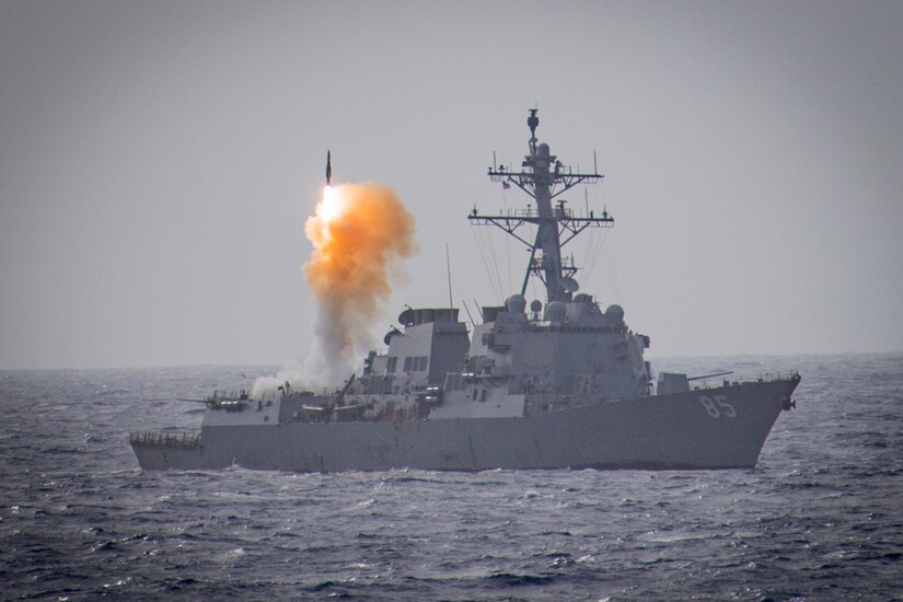 A ship launches a missile.