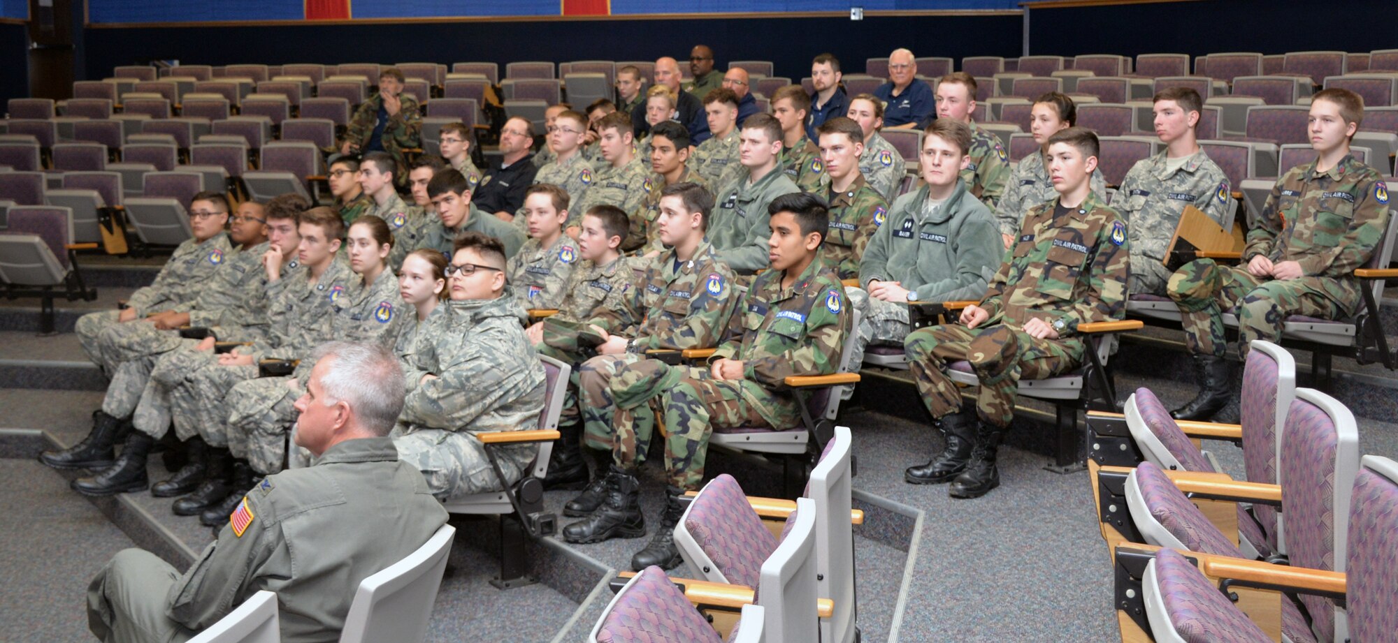 Civil Air Patrol cadets and leaders listen as Lt. Col. Matthew Van De Walle, 356th Airlift Squadron instructor pilot, presents the wing’s mission briefing at Joint Base San Antonio-Lackland, Texas March 12, 2019. The cadets visited the Alamo Wing for an incentive flight on a C-5M Super Galaxy.