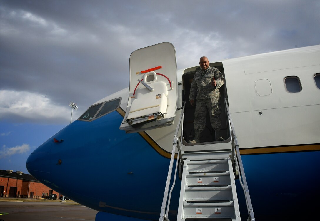 Maintenance checks plane to launch C-40C aircraft