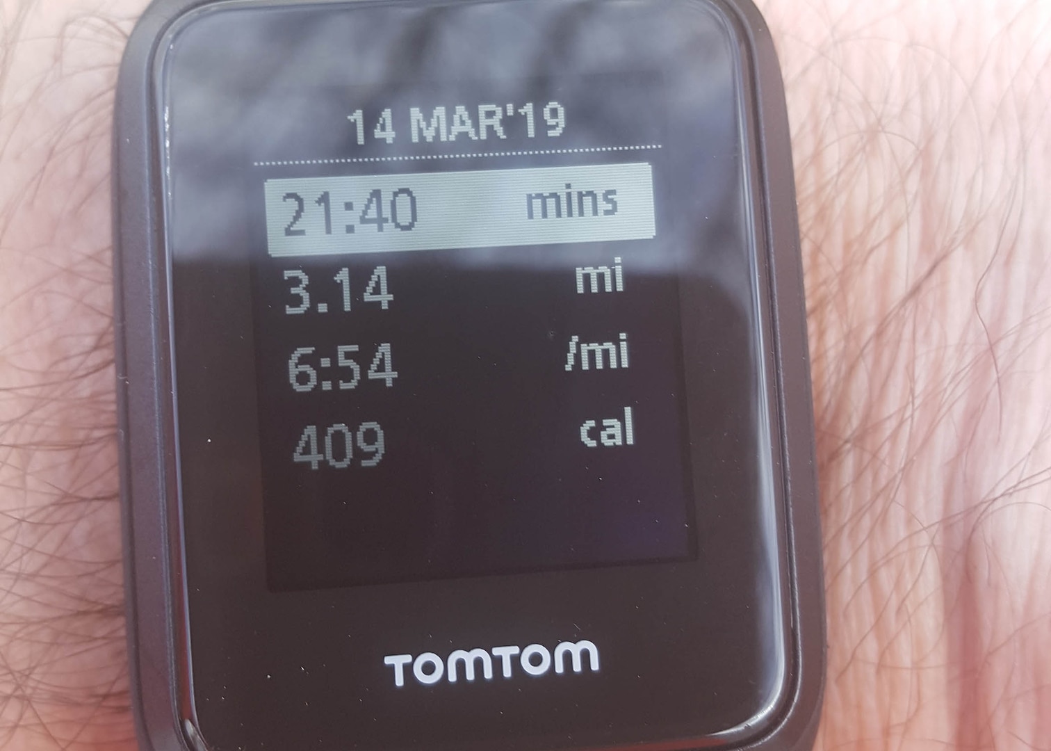 Tech. Sgt. James Vandenberg uses his fitness watch to share his time for the 3.14 mile run.