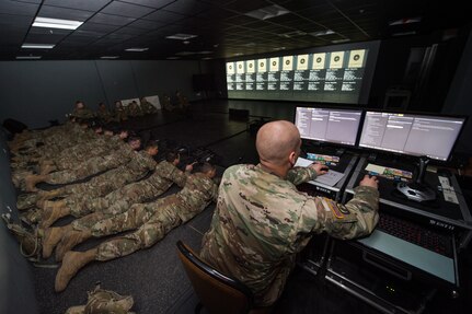 U.S. Army Sgt. 1st Class Richard Swink, Foxtrot Company, 1st Battalion, 210th Aviation Regiment, 128th Avn. Brigade drill sergeant, operates the Engagement Skills Trainer at Joint Base Langley-Eustis, Virginia, March 20, 2019.