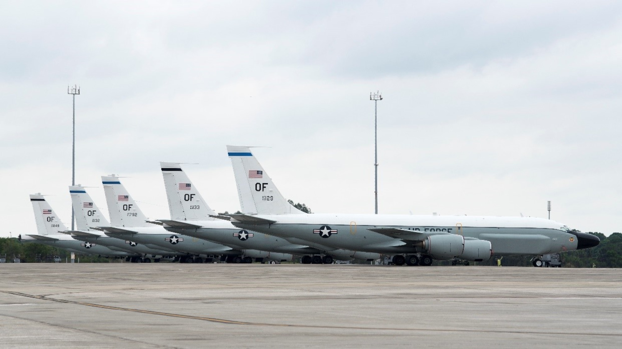 Five RC-135 Rivet Joint reconnaissance aircraft assigned to the 55th Wing, Offutt AFB, Nebraska, rest on the flightline at MacDill Air Force Base, Fla. The aircraft evacuated to MacDill due to rising floodwaters at Offutt, providing a safe location to bed down out of harm’s way. The RC-135s support a worldwide mission for theater and national level consumers with near real time on-scene intelligence collection, analysis and dissemination capabilities.