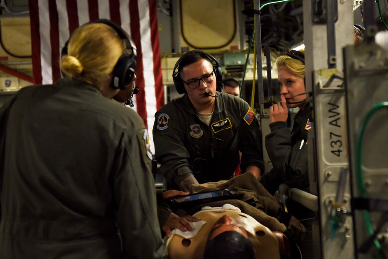 The 43 Air Mobility Operations Group partnered up with 437th Airlift Wing, Charleston S.C. to execute the off-station training. Airmen from the 43rd Operations Support Squadron, 43rd Aeromedical Evacuation Squadron,   and the 43rd Medical Squadron worked with Airmen from the 14th Airlift Squadron and 16th Airlift Squadron to meet several training objectives. The training received was an integral part in obtaining initial qualification as well as meeting sustainment training requirements. (U.S. Air Force Photo by MSgt Katherine Novales)