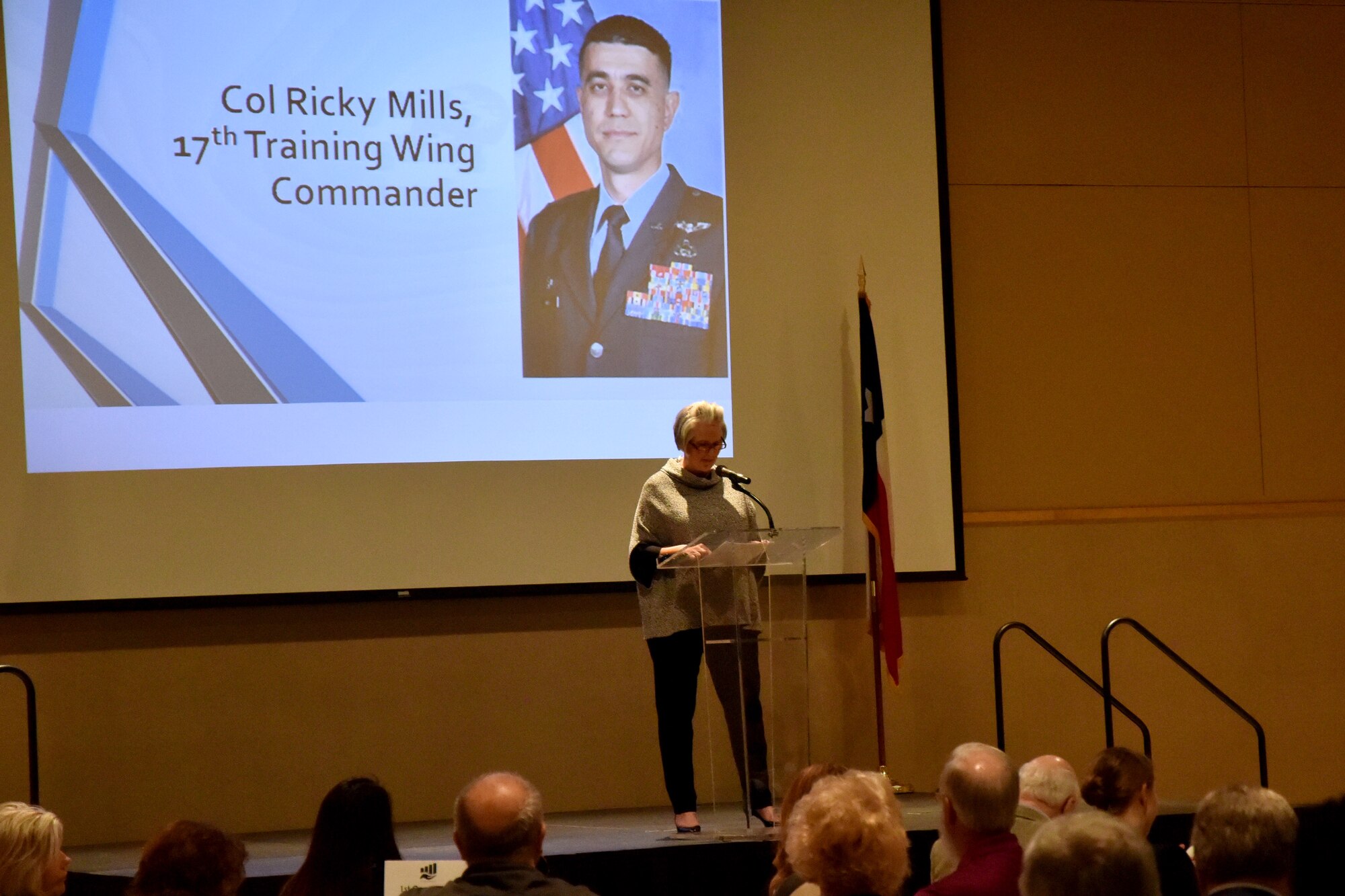 San Angelo Chamber of Commerce Board member, Sheryl Pfluger, introduces U.S. Air Force Col. Ricky Mills, 17th Training Wing commander, during the Chamber of Commerce Membership Luncheon at the McNease Convention Center in San Angelo, Texas, March 19, 2019. Mills gave an update to civic leaders about the accomplishments and progress of Goodfellow Air Force Base. (U.S. Air Force photo by 2nd Lt. Matthew Stott/Released)