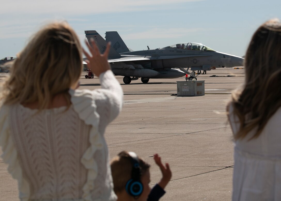 Families of Marines with Marine Fighter Attack Squadron 225, Marine Aircraft Group 11, 3rd Marine Aircraft Wing, welcome home their loved ones at Marine Corps Air Station Miramar, Calif., March 15, following a six-month Unit Deployment Program in Japan. Marines and Sailors flew, fixed, and fought alongside foreign forces throughout Guam, South Korea, and Japan as part of America’s Expeditionary Force in Readiness. (U.S. Marine Corps photo by Lance Cpl. Julian Elliott-Drouin)