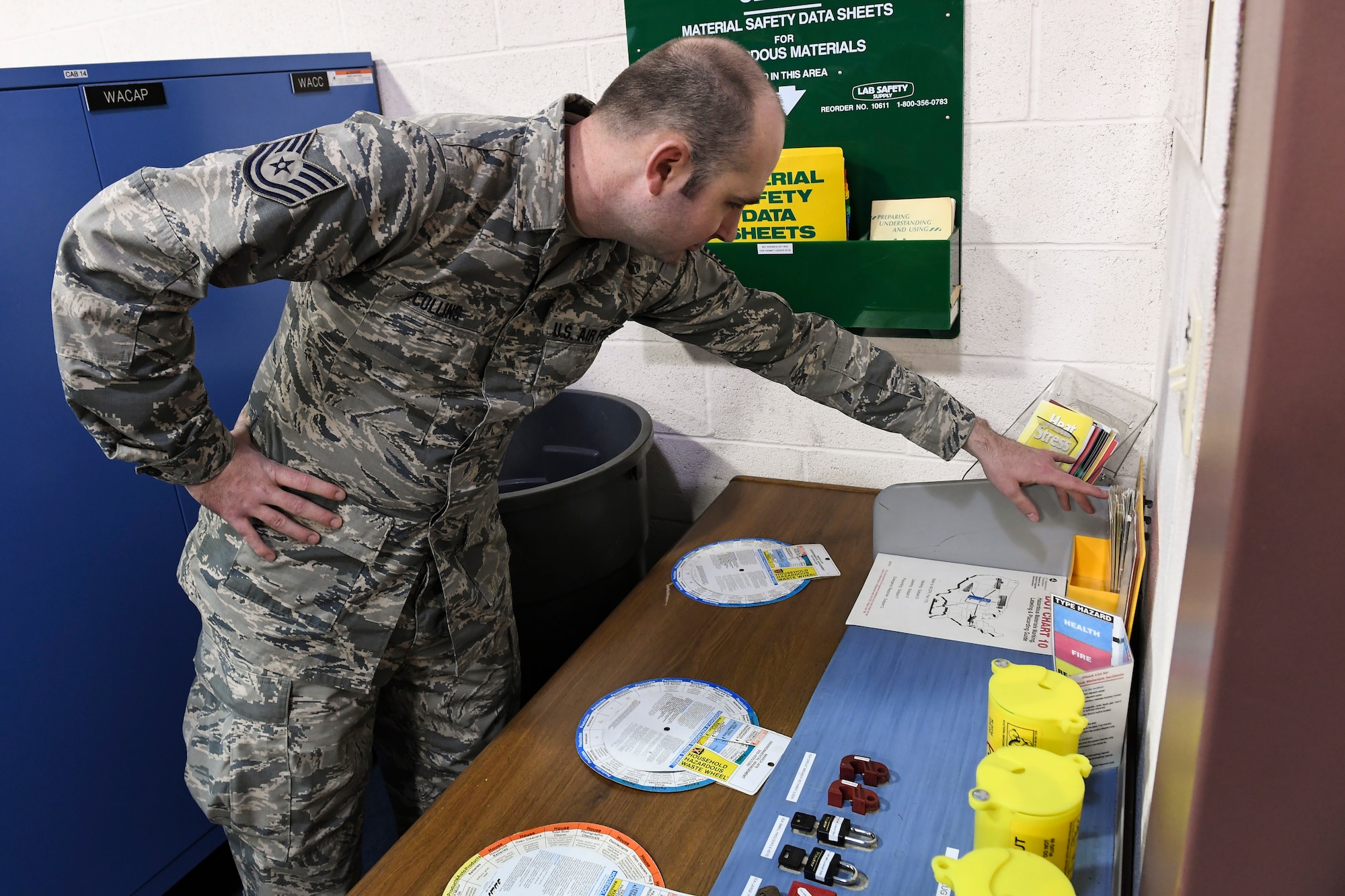 Tech. Sgt. Steven Collins, occupational safety technician with the 911th Airlift Wing Safety Office, reviews the lockout tagout program the 452nd Maintenance Squadron has in place at March Air Reserve Base, California, March 6, 2019. The lockout tagout program is a safety program where personnel shut down a piece of equipment and attach a pad-lock to it that only they can unlock to remove to restore power to the machine. (U.S. Air Force photo by Joshua J. Seybert)