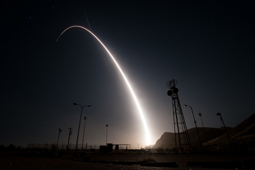 A rocket launches at night