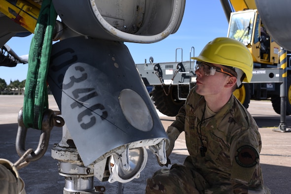Staff Sgt. Cody Walker, 39th Maintenance Squadron crew chief, inspects a sling attached to the landing gear of an F-4 Phantom II March 8, 2019, at Incirlik Air Base, Turkey.