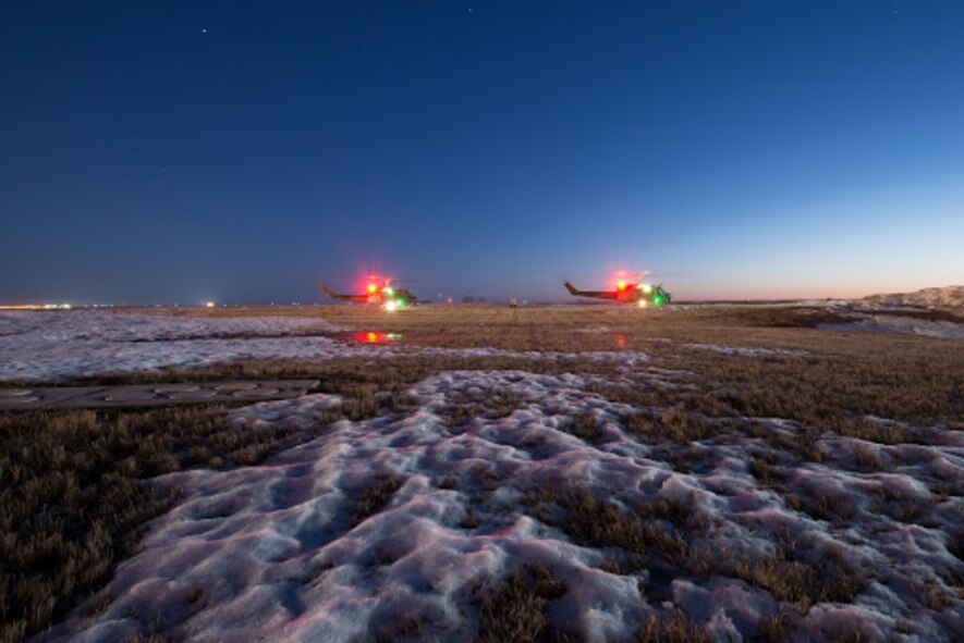 Night Flight: Hueys take off at Minot AFB