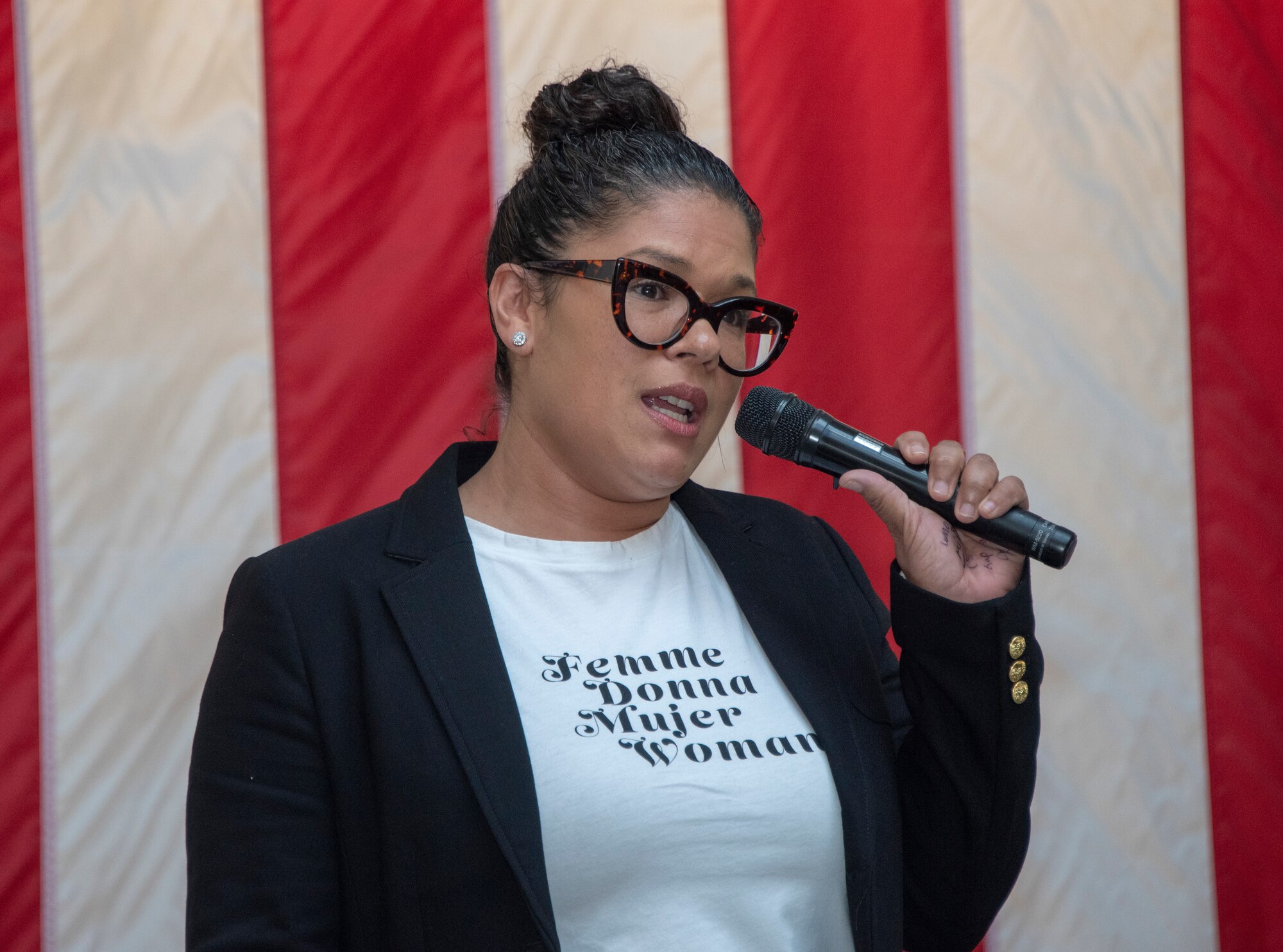 U.S. Air Force Master Sgt. Sophia Rodriguez, 144th Fighter Wing, delivers remarks during the Women’s History Month social gathering, March 20, 2019, at Travis Air Force Base, California. Since 1987, the month of March has been designated to celebrate the historical and ongoing achievements and contributions of women. Members of the Women Inspiring the Next Generation’s Success committee were responsible for organizing the event which included an exhibit highlighting extraordinary female heroes and featured speakers prominent in the Travis community. (U.S. Air Force photo by Heide Couch)