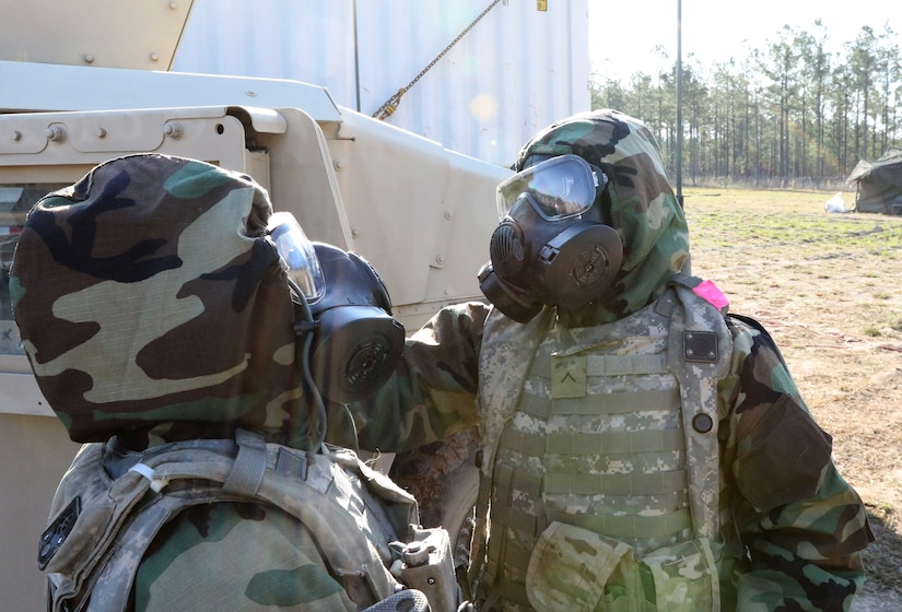 Two female Soldiers teaming up at JRTC