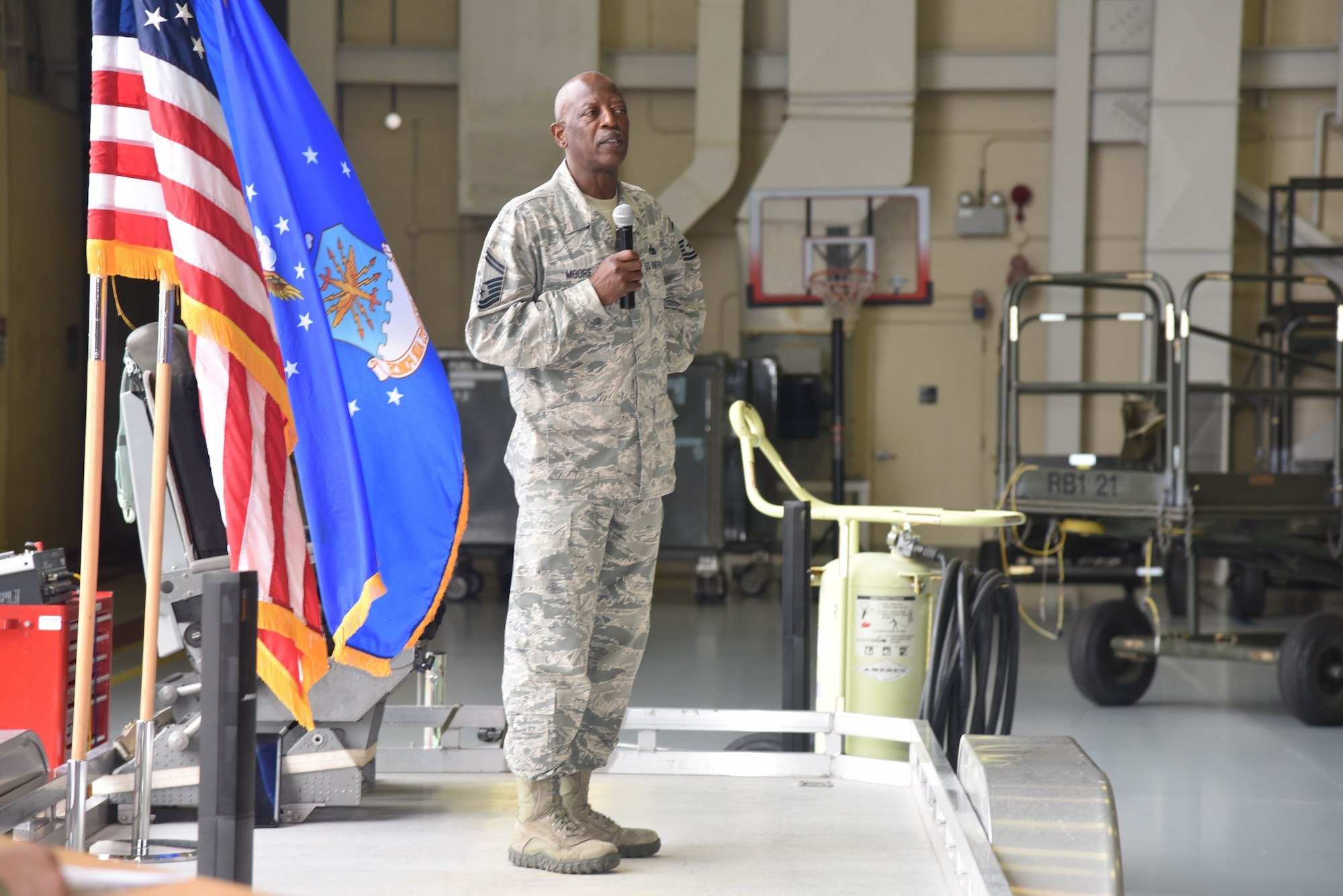 Senior Master Sgt. Charles Moore, 803rd Aircraft Maintenance Squadron production superintendent, addresses gathering during his retirement ceremony, March 8, 2019.  Moore offiicially retires from a 33 year military career, April 1, 2019. (U.S. Air Force photo by TSgt. Michael Farrar)