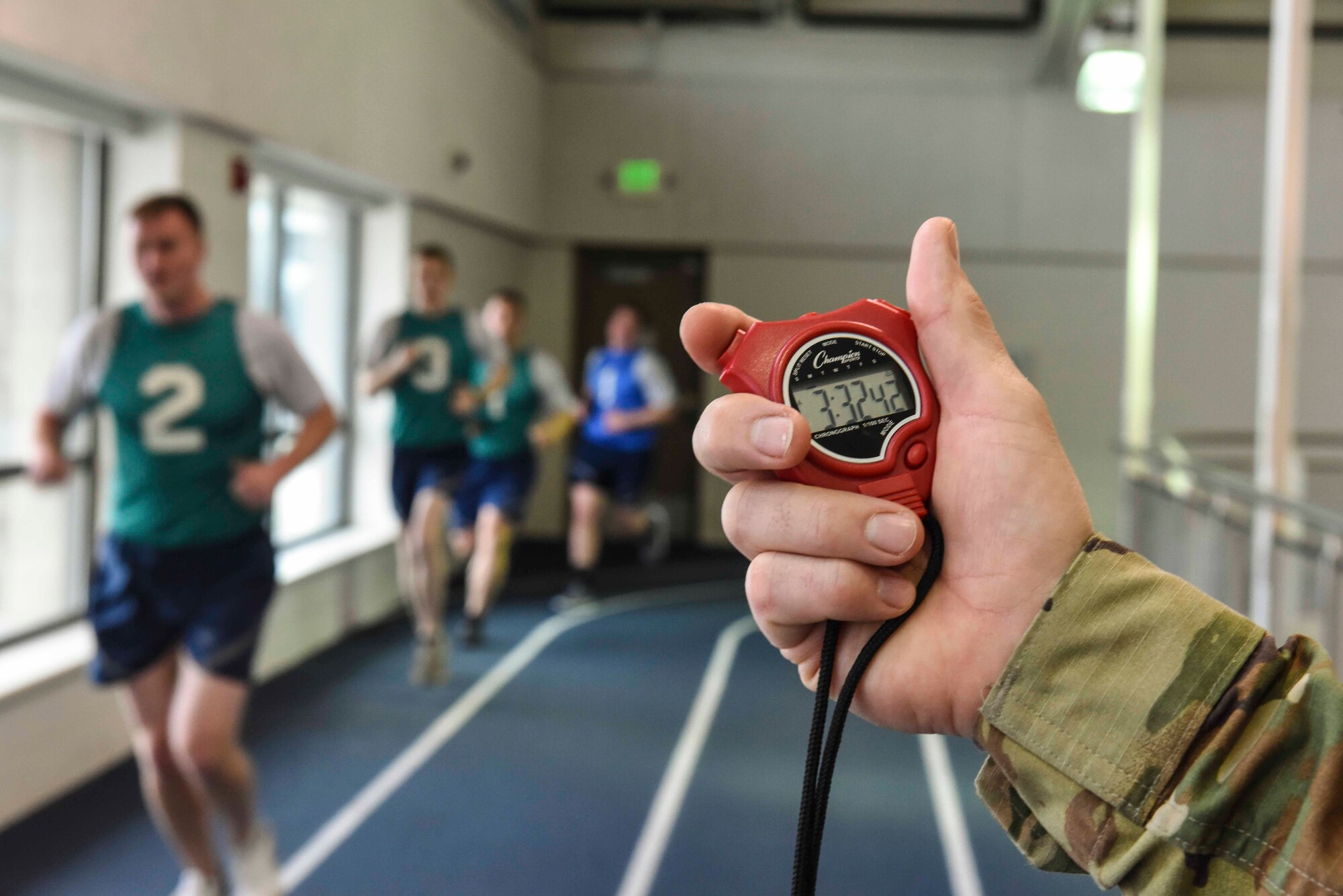 Airmen perform the 1.5-mile run portion of the Air Force physical fitness test March 2, 2019, at the Warrior Fitness Center on Hill Air Force Base, Utah