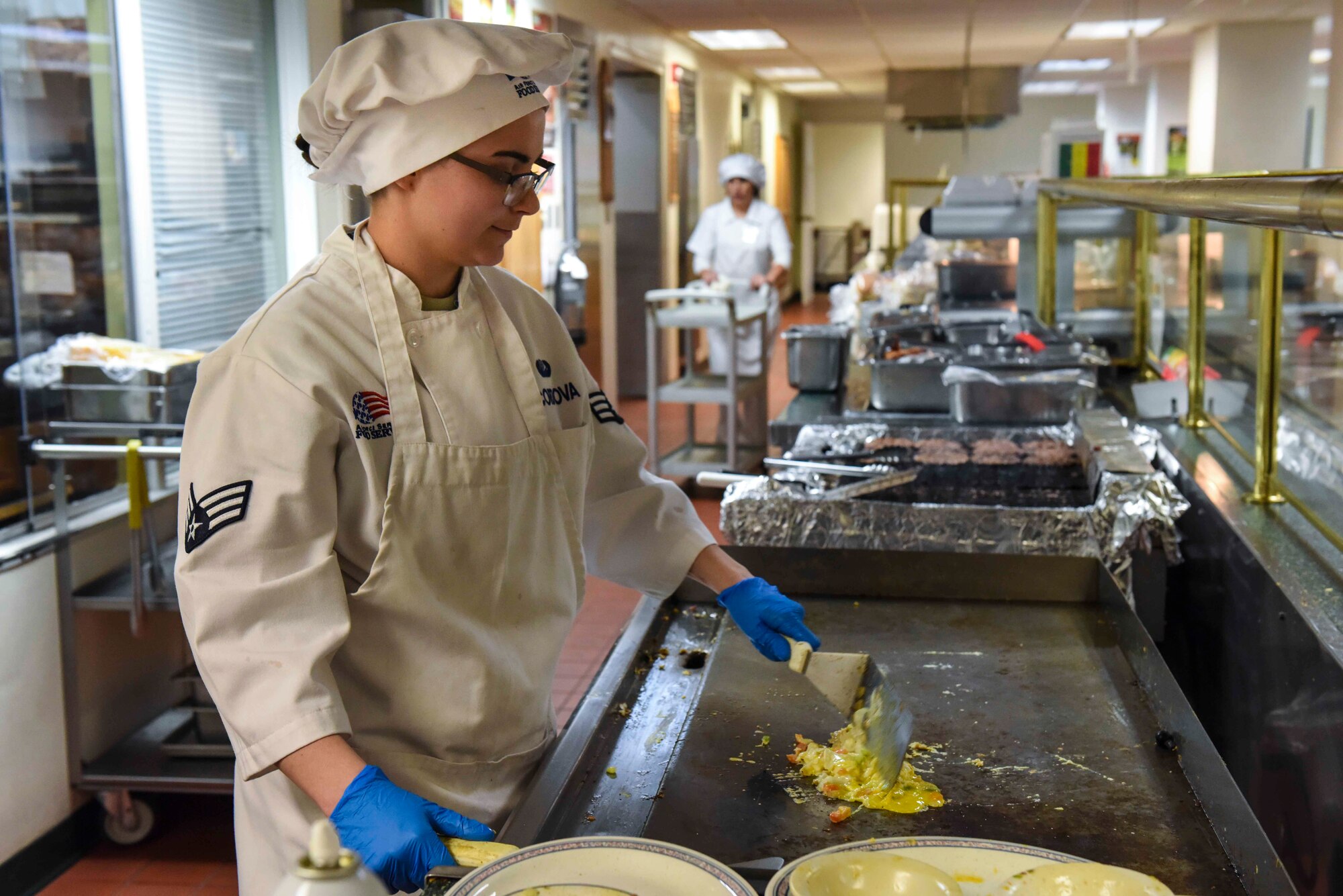 Senior Airman Autumn Cordova, a food services specialist in the 419th Sustainment Services Flight, cooks an omelet March 2, 2019, at the Hillcrest Dinning Facility on Hill Air Force Base, Utah.