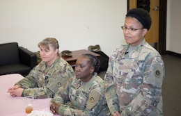 From left to right – Maj. Everetta Davis, knowledge management officer, Sgt. Major Gail Lashley, senior enlisted advisor, logistics, G-4, and Sgt. Maj. Tonya Cason, senior enlisted advisor, Support Operations (SPO), 1st Theater Sustainment Command (TSC), listen to Soldiers talk March 15 at the first meeting of the 1st TSC’s Sisters in Arms program. (U.S. Army photo by Master Sgt. Jonathan Wiley)